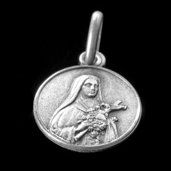 Medalik św Teresy,  Święta Teresa od dzieciątka Jezus.    Medalik srebrny oksydowany. 2,0 g