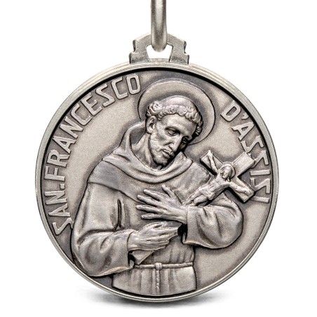 Duży medalion srebrny z wizerunkiem św Franciszka z Asyżu. Medalik ze srebra o średnicy 25mm.