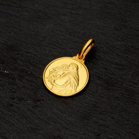 Złoty medalik.  14 mm,  2,2 g